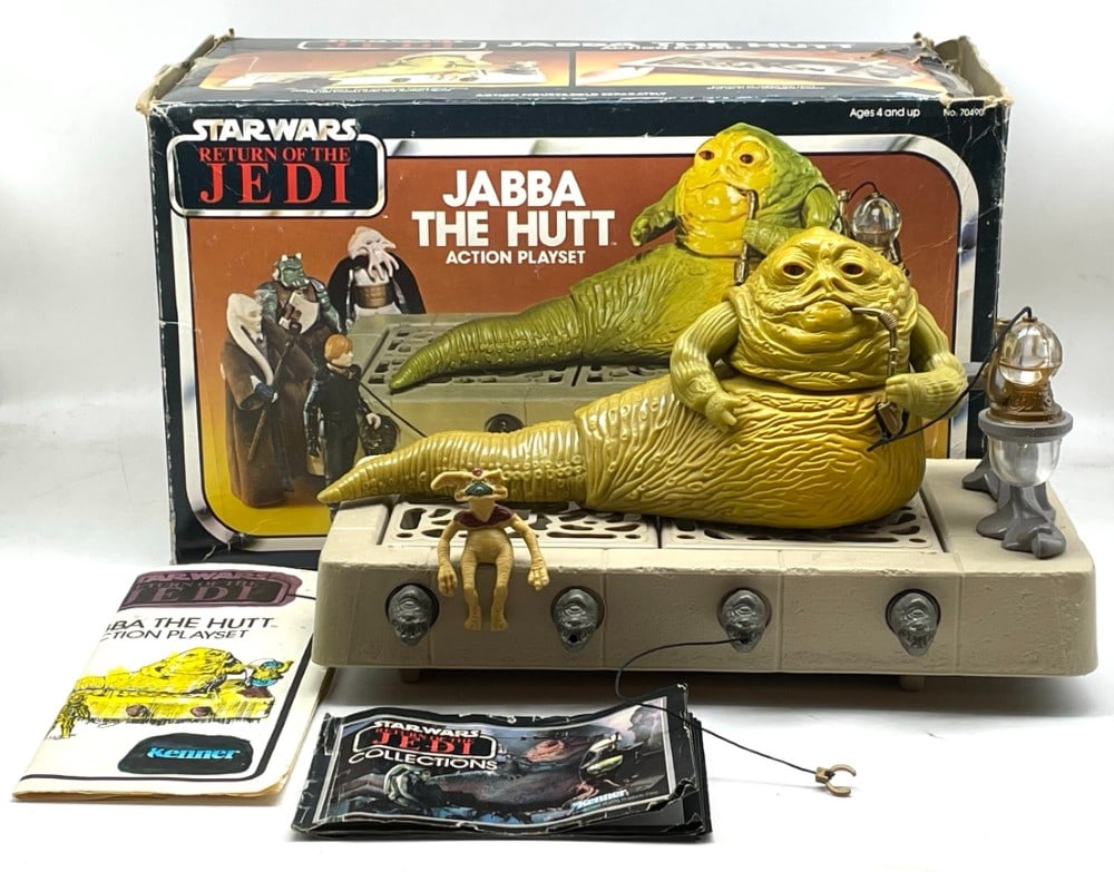 1983 Star Wars Jabba The Hutt Action Play Set: 1983 Kenner Star Wars Jabba The Hutt Action Play Set. Play Set is in overall good condition and Box is in Rough Condition with Manuals.
