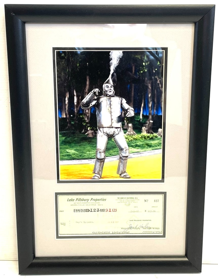 1967 Jack Haley Signed Bank Check: 1967 Jack Haley Signed Bank Check. Check is Made out to Ray?s Liquors from Lake Pillsbury Properties with Photograph. 14? x 20