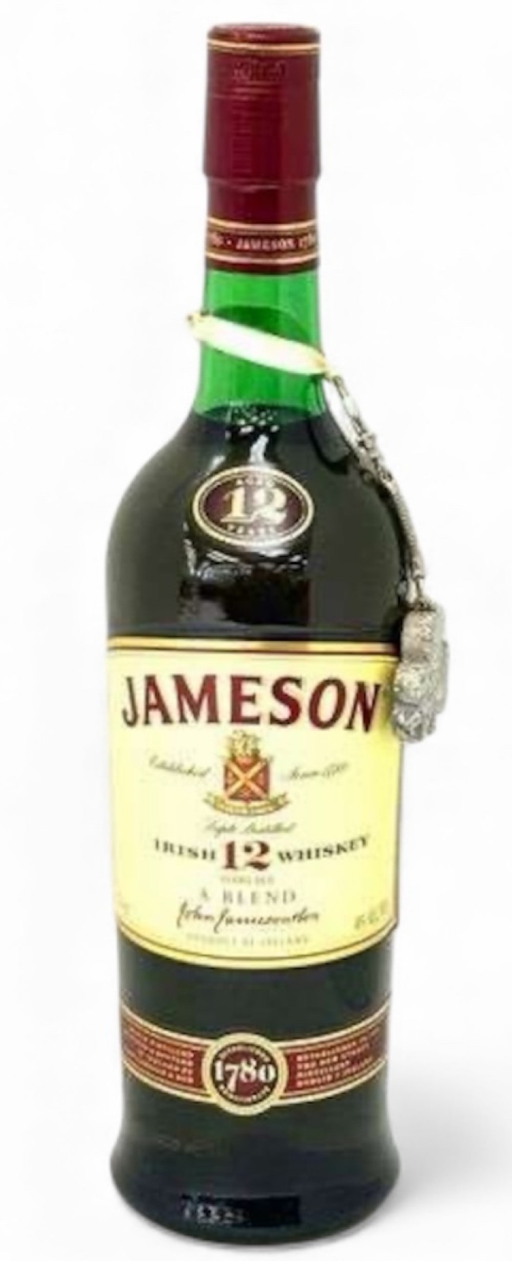 12 Years Old Triple Distilled Jameson Irish Whiskey 750ml With Marble Shamrock Chain: 12 Years Old Triple Distilled Jameson Irish Whiskey 750ml With Marble Shamrock Chain. This 12 years old Jameson whiskey has its original factory seal and is in great condition. It includes what appear