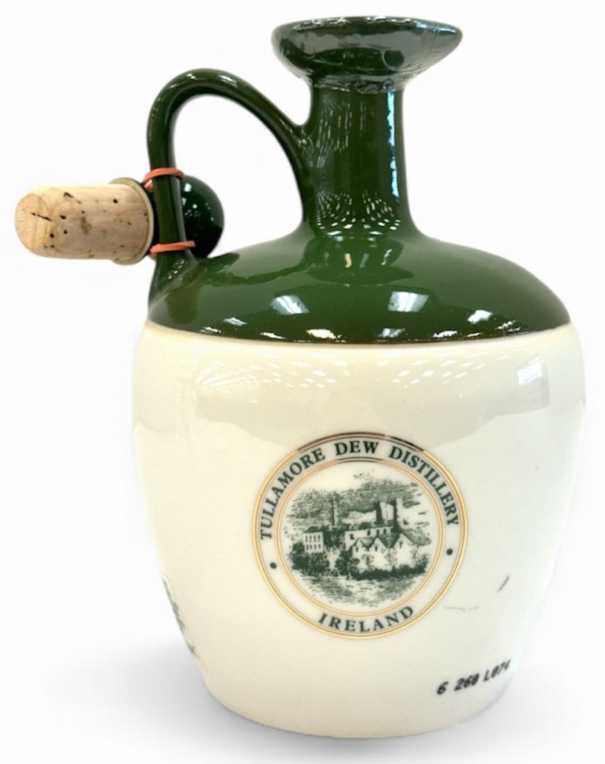 Tullamore Dew Irish Whiskey Ceramic Jug Decanter 80 Proof 750ml: Tullamore Dew Irish Whiskey Ceramic Jug Decanter 80 Proof 750ml. This decanter of Irish Whiskey is in fantastic condition and still has the original factory seal along with a cork lid to use once open
