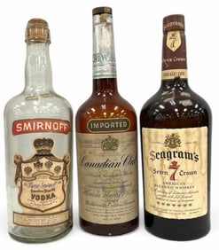 Large Empty Bottles of Canadian Club Whiskey, Smirnoff Vodka, & Seagram's American Whiskey