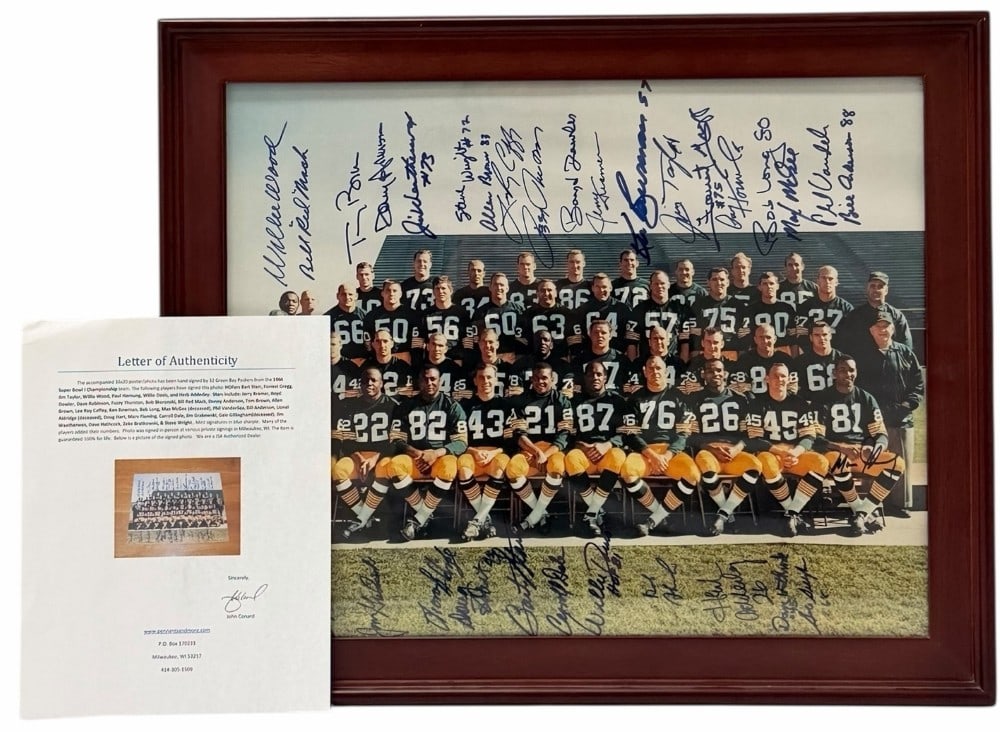 1966 Super Bowl I Championship Team Autographed Green Bay Packers Framed Print: 1966 Super Bowl I Championship Team Autographed Green Bay Packers Framed Print. This print features a team photo of the 1966 Super Bowl I Championship Team with all 32 player autographs. A Letter of A