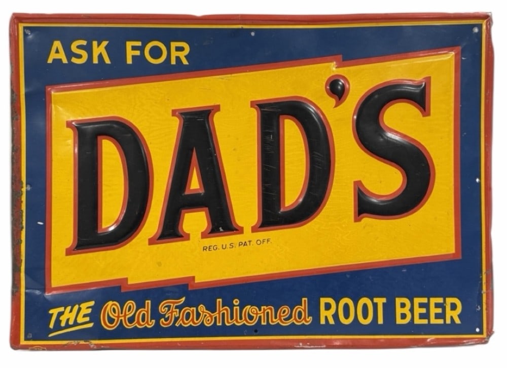Vintage SST Dad's Root Beer Embossed Sign: Vintage single sided embossed tin Dad's Root Beer advertising sign. Has paint loss, surface rust, scratches, bent corners / edges, and other wear from use and age. Still displays well with nice colors