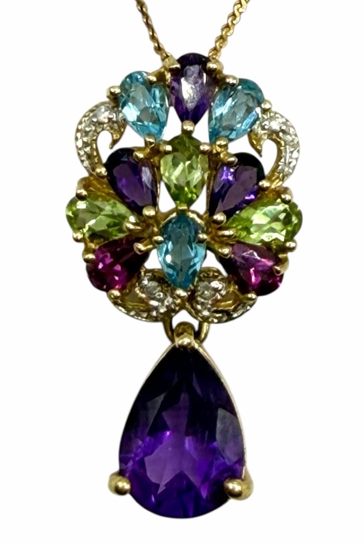 10k Yellow Gold Multi-Stone Pendant with 14k Yellow Gold Chain: 10k Yellow Gold Multi-Stone Pendant with 14k Yellow Gold Chain.? This beautiful pendant is composed of Amethyst, Citrine, and Blue Topaz with a larger pear cut purple amethyst dangle.? Pendant measure