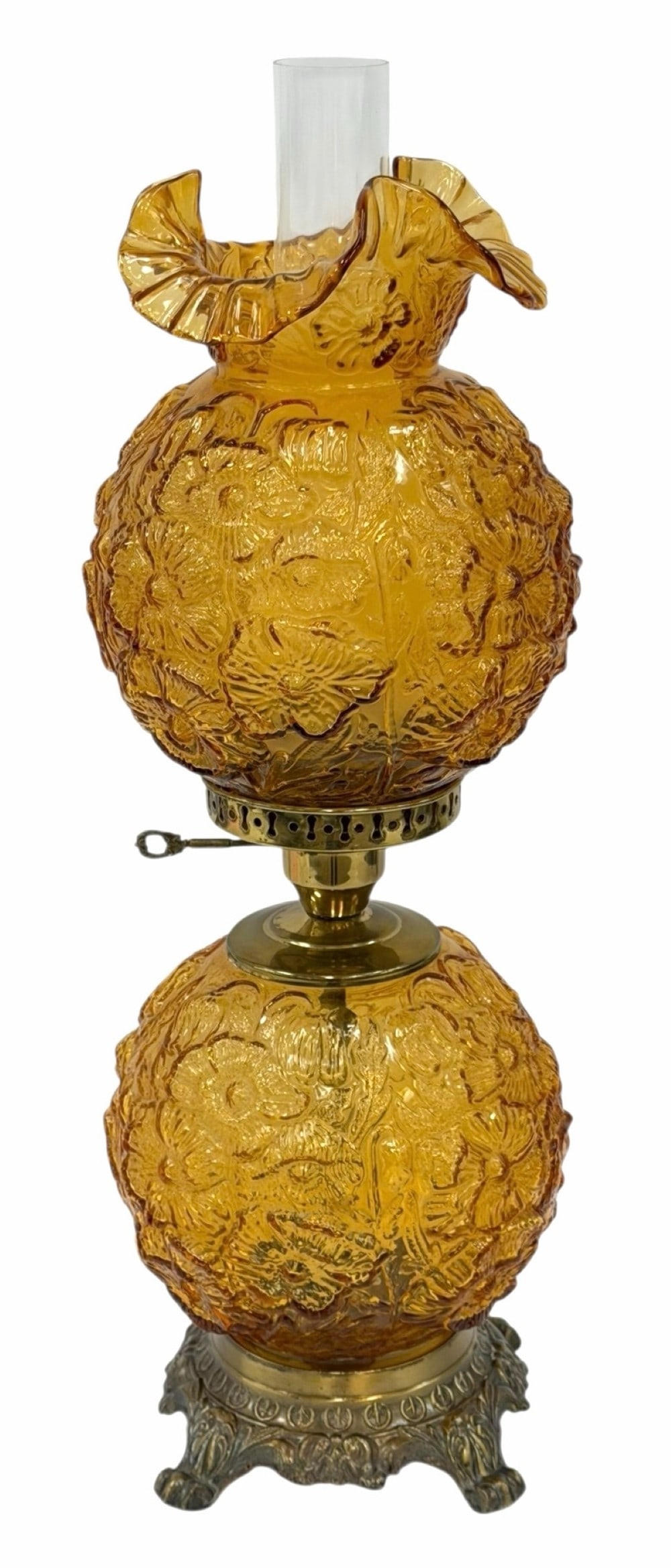 Vintage Fenton Amber Poppy Gone With The Wind Glass Lamp: Vintage Fenton Amber Poppy Gone With The Wind Glass Lamp. This beautiful lamp has a unique poppy pattern all throughout. It is in good working? condition and measures approximately 2ft tall x 9" wide.