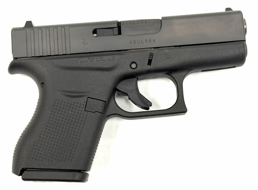 Glock 43 .9mm Semi Automatic Pistol in Case: Glock 43 .9mm Semi Automatic Pistol in Case.? The Glock 43 .9mm pistol is in very nice used condition.? Barrel measures 3 inches in length.? Frame is in new condition.? Action is tight.? The serial nu
