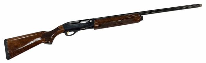Remington Model 1100 Sporting 12 .12 Ga Semi Automatic Shotgun in Box