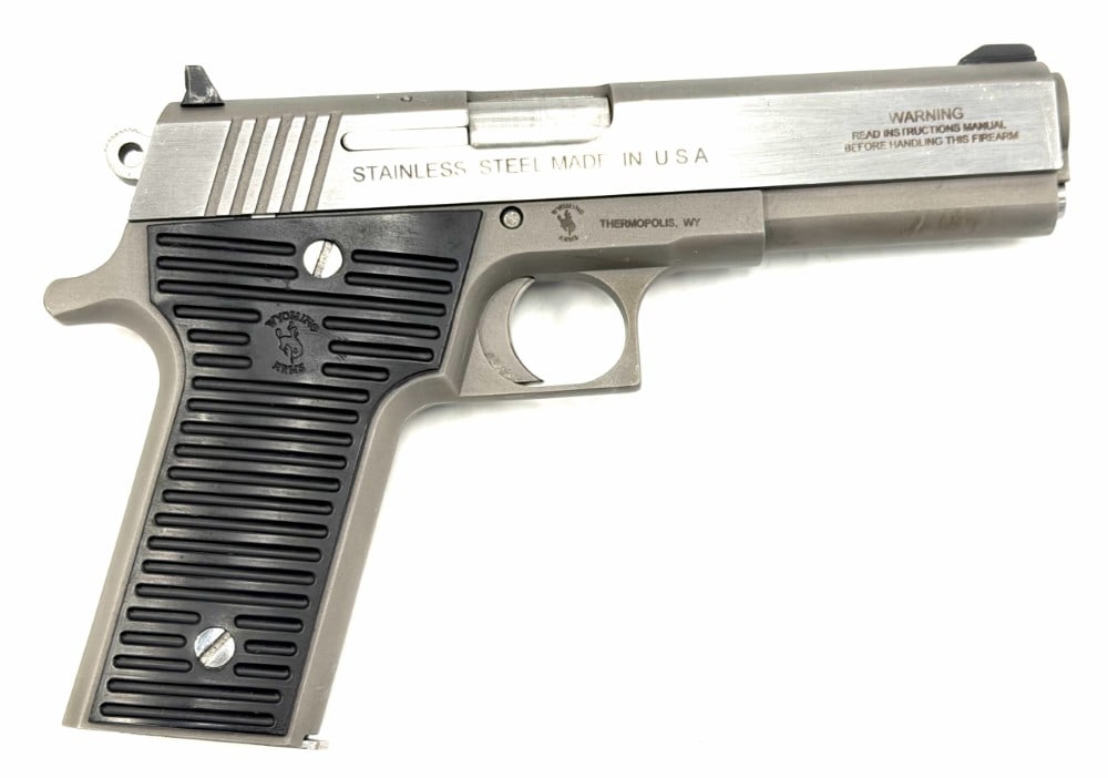 Wyoming Arms Parker .45 Caliber Semi Automatic Pistol: Wyoming Arms Parker .45 Caliber Semi Automatic Pistol.? The Wyoming Arms Parker stainless pistol is in very nice used condition.? The Barrel measures 4 7/8 inches in length.? Plastic grips are in very