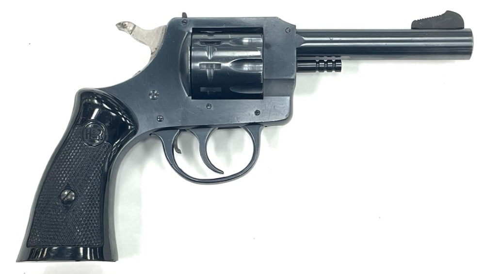 H&R Model 929 .22LR 9-Shot Revolver: H&R Model 929 .22LR 9-Shot Revolver.? The H&R model 929 is in very nice used condition.? Barrel measures 4 inches in length.? Blueing is strong, black plastic grips are in very nice used condition. ?