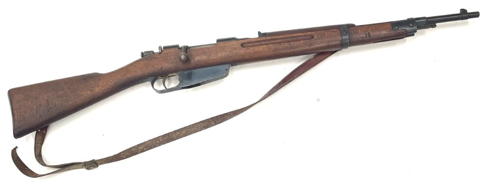 Italian Carcano Model 38 7.35mm Bolt Action Rifle: Italian Carcano Model 38 7.35mm Bolt Action Rifle.? The Italian Carcano model 38 bolt action rifle is in nice used condition.? Barrel measures 22 inches in length.? Barrel reads 1939 XVII,? barrel doe