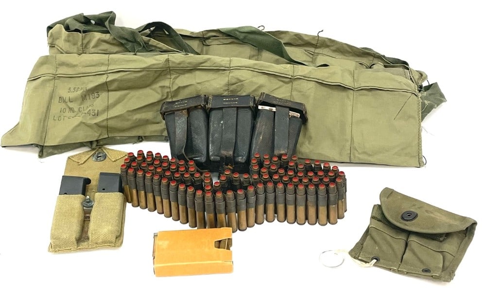 403 Rounds of Ammo in Military lot of WW2/Vietnam Era Ammo, Pouches and Bandoliers,: 403 Rounds of Ammo in Military lot of WW2/Vietnam Era Ammo, Pouches and Bandoliers. Lot Consists of 291 Rounds of 5.56 ball Ammo on Stripper Clips in 5 cloth Bandoliers 4 Full 1 Partial, 25 Rounds of 