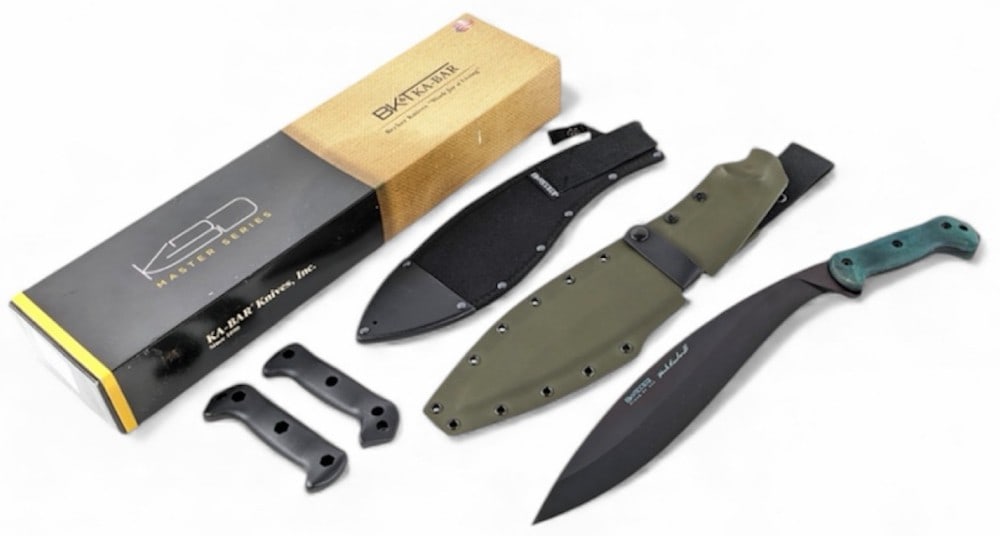 NIB BK&T Ka-Bar BK21 Becker Reinhardt Kukri w/ Sheath: Features a black finish kukri blade, and gray canvas micarta handle scales. Comes with both a plastic and nylon sheath. Knife is in new condition. Blade length measures 13-1/4in and overall 18-3/4in.