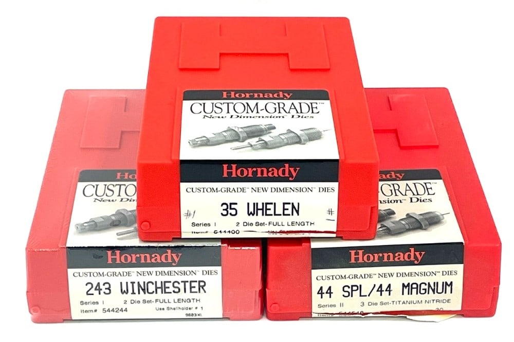 1 New and 2 Used Hornady Custom Grade New Dimension Die Set: 1 New and 2 Used Hornady Custom Grade New Dimension Die Set. Lot is for 1 New in Unwrapped Box 243 Winchester, 1 Used 44SPL/44 Mag, and 1 Used 35 Whelen Die set. 3 Total.