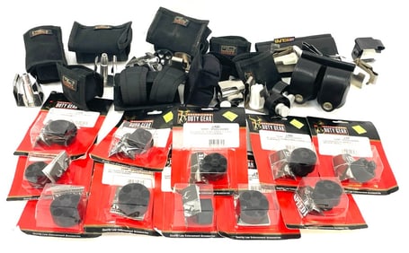 Group of Safariland Speedloaders in Packages with Nylon Cases and Holders