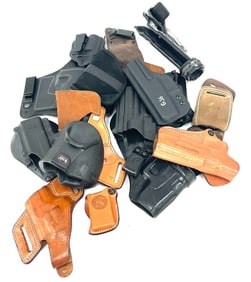 Assortment of Leather & Hard Plastic Pistol Holsters