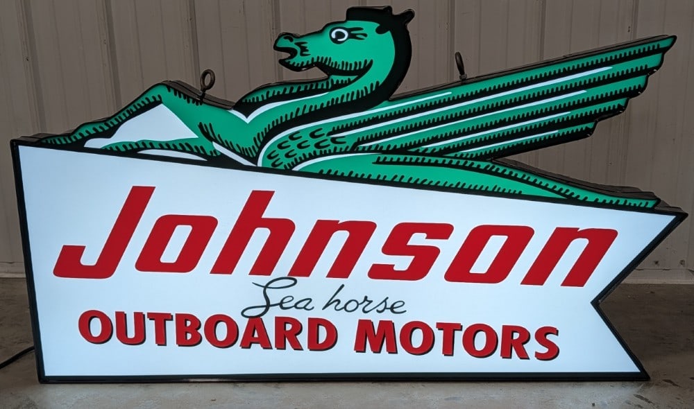 4-1/2ft Custom Johnson Sea Horse Outboard Motors Lighted Sign: Large custom single sided Johnson Sea Horse lighted advertising sign. It features a metal can and plastic face. Nice working condition with light wear from displays and storage. It measures approximat