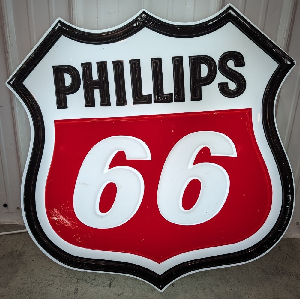 Phillips 66 Gas Station Embossed Lighted Shield Advertising Sign: Single sided embossed plastic Phillips 66 Gas station lighted advertising sign. Appears to be in good working condition with some paint loss, scratches / scuffs, and some expected cracks on the corner