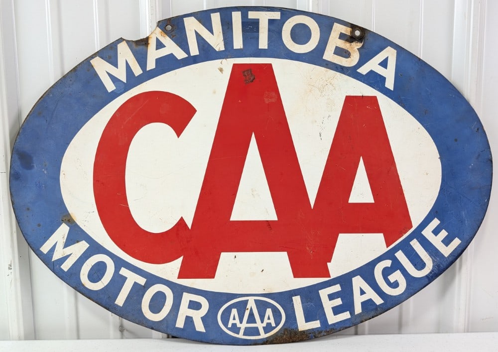 Vintage DST CAA Manitoba Motor League AAA Sign: Vintage double sided metal CAA Manitoba Motor League sign. Has paint loss, surface rust, some damage to the top edge, and other wear from use and age. Measures approximately 27in across by 19in tall