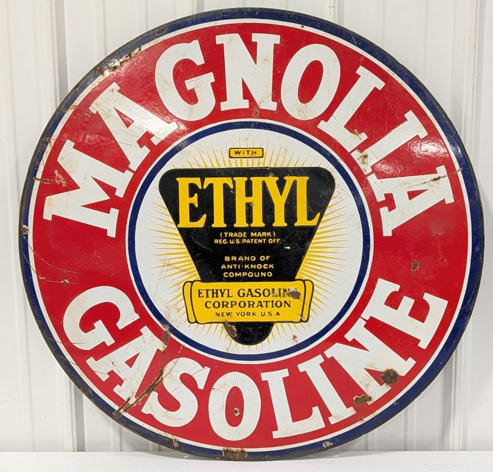 30in Vintage DSP Magnolia Gasoline w/ Ethyl Sign: Vintage double sided porcelain Magnolia Gasoline advertising sign. Has porcelain loss, surface rust, scratches, and other wear form use and age. Displays well with nice colors and gloss. It measures a