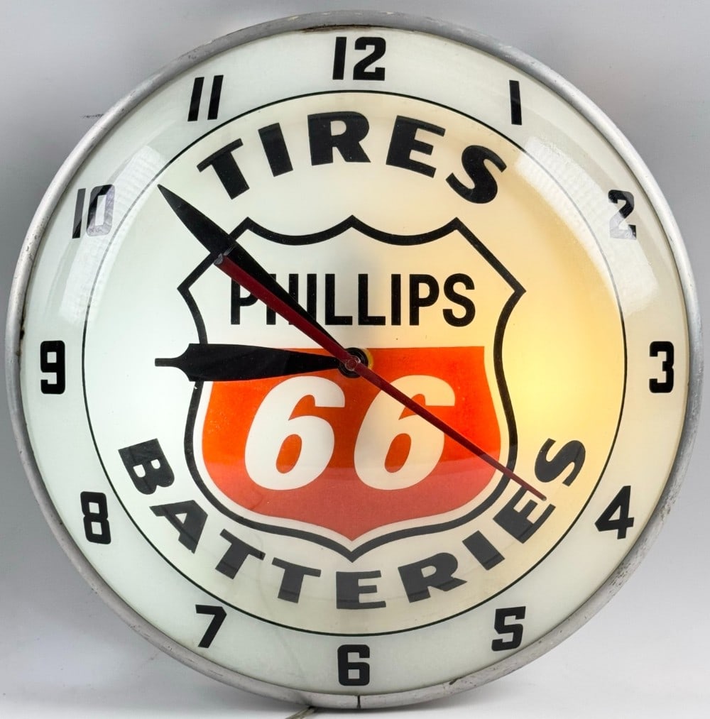 Vintage Phillips 66 Service Station Double Bubble Advertising Lighted Clock: Vintage Phillips 66 double bubble lighted advertising glass clock. Appears to be in overall good condition with paint loss, surface rust on can, and other wear from use and age. The inner bubble appea