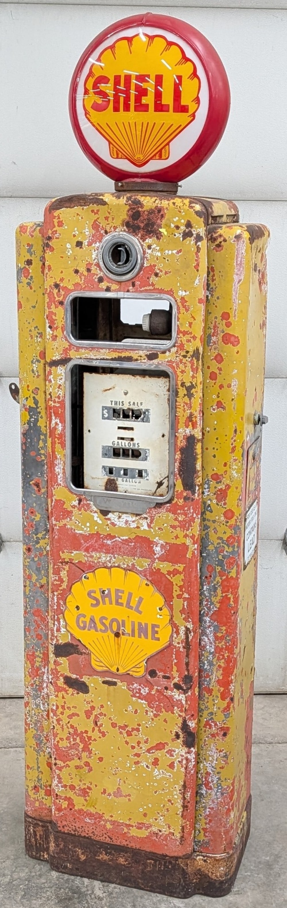 Unrestored Wayne Model 70 Gas Pump: Unrestored Wayne model 70 Gas Pump. Has paint loss, rust, missing components, and other damage / wear from use and age. Displays well with reproduction Shell globe and pump plate. Overall it measures
