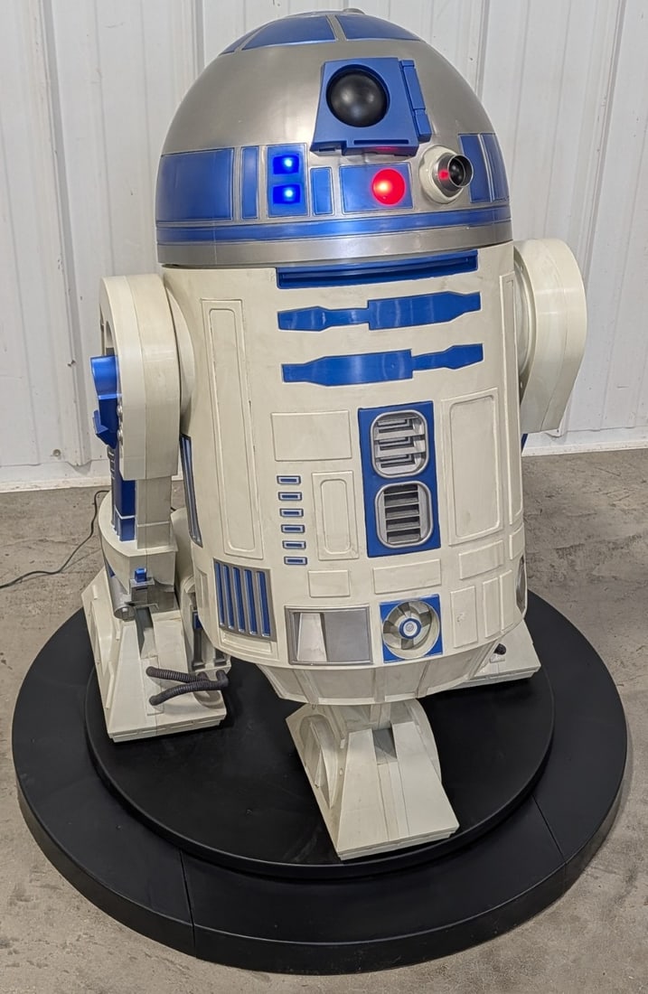 Life Size Star Wars R2-D2 Astromech Droid Animated Prop: Life size animated R2-D2 Astromech Droid from Star Wars. Appears to be in good cosmetic condition with some scratches and wear from display and storage. When powered on the R2 unit can either be stati