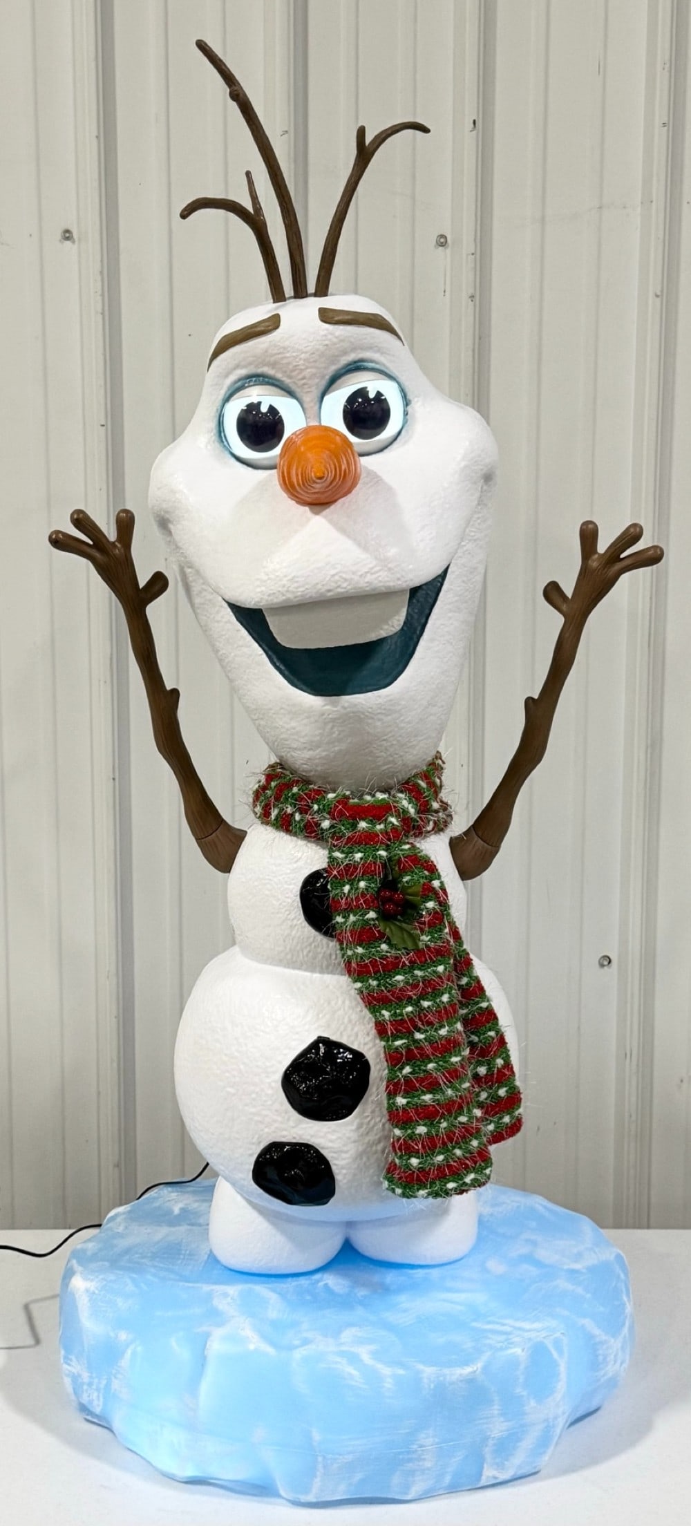 4ft Life Size Disney Frozen Olaf Animated Snowman: Life size animated Olaf from Disney?s Frozen. When activated Olaf lights up, eyes move, head turns, mouth moves, and he says movie phrases. Appears to be in nice working condition with some wear from