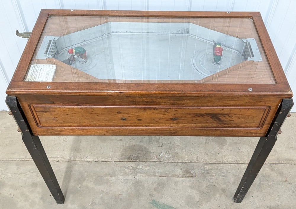 Early 10? Coin Operated Ice Hockey 2-Player Mechanical Arcade Game: Unique early coin operated two player Ice Hockey mechanical arcade game. Appears to be in good cosmetic condition for its age with scratches and wear to wood case and legs. Cast Metal hockey players a