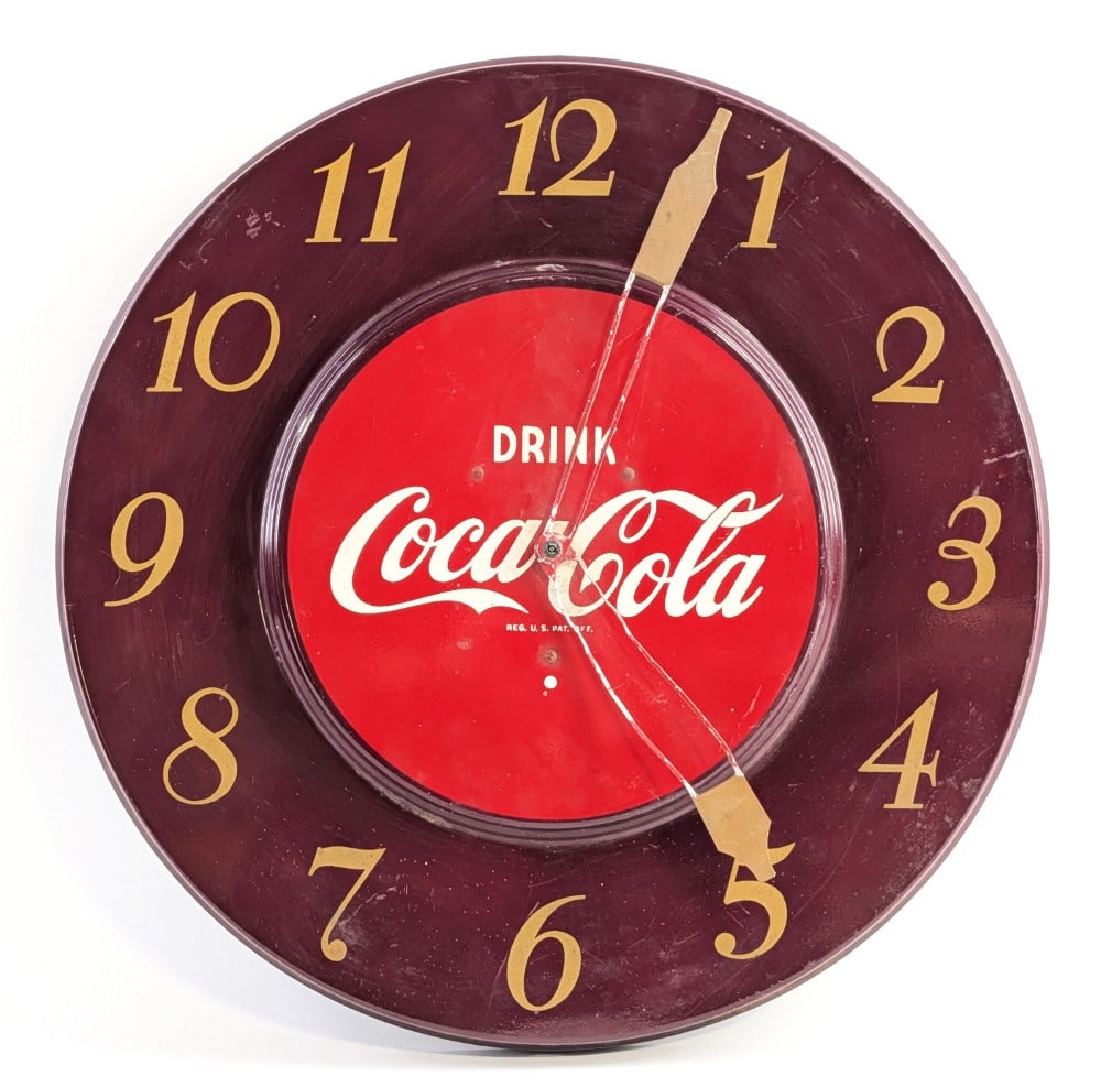 Vintage Metal Drink Coca-Cola Advertising Clock: Vintage metal "Drink Coca-Cola" advertising clock. The clock hands show bending and paint loss. The mounting hole on the back side is damaged. The clock has wear from use and age. The clock was runnin
