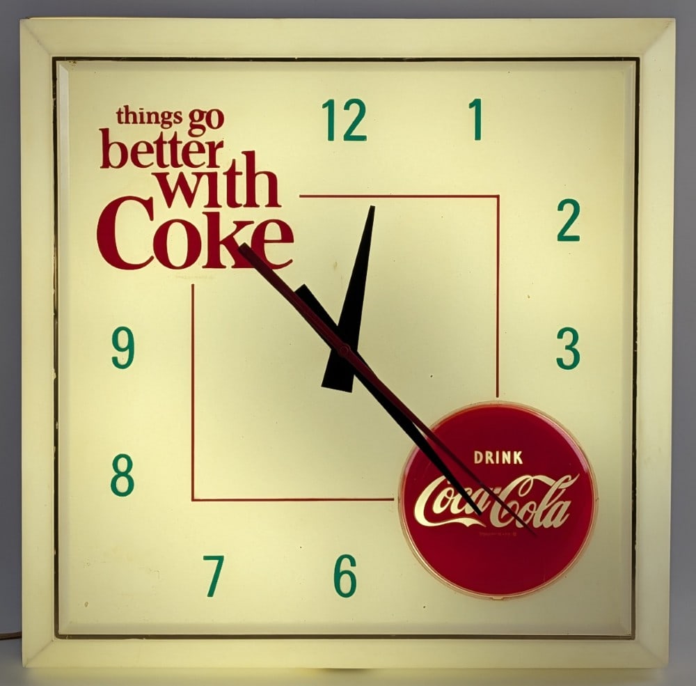 Vintage Drink Coca-Cola Advertising Clock by Hanover Manufacturing: Vintage Coca-Cola "Things Go Better With Coke" drink Coca-Cola advertising clock. The clock has some scratches and wear from use and age. The clock lights up and runs as it should. The clock is emboss