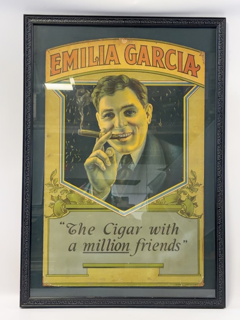 Framed Emilia Garcia Cigars Cardstock Advertising Sign: Framed Emilia Garcia Cigars cardstock advertising sign. The sign was originally a tri-fold display that has been cut. It shows corner damage, soiling, and wear from age. The frame measures approximate