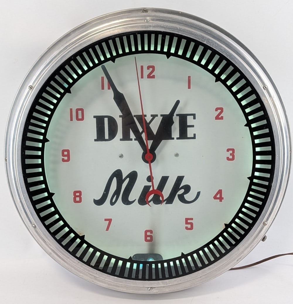 Vintage 20in Dixie Milk Neon Advertising Clock By Swihart: Vintage Dixie Milk Neon advertising clock by Swihart. Appears to be in good working condition with scratches and other wear from use and age. Appears to work well. It measures approximately 20in in di