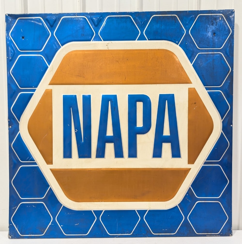 Vintage SST NAPA Auto Parts Embossed Sign: Vintage single sided embossed tin NAPA advertising sign. Has scratches, discoloration, and other wear from use and age. Should clean up. It measures approximately 35in tall by 35in across.