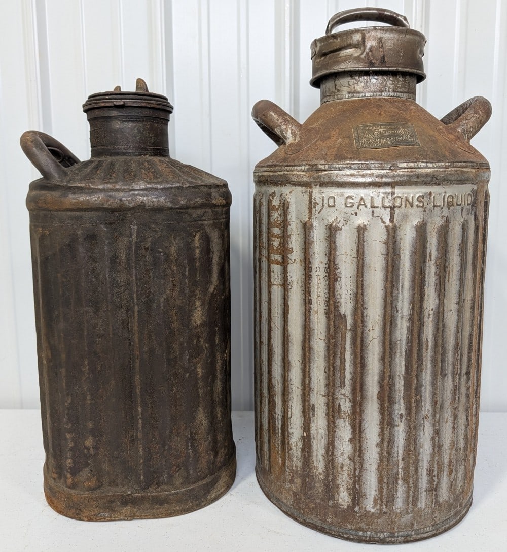 Early Gas Station 5 & 10 Gallon Oil / Gasoline Cans / Ellisco & Davis Welding: Lot of two early service station five and 10 gallon oil / gas cans. Lot includes a 5 gallon Davis Welding and a 10 gallon Ellisco.They vary in condition with paint loss, dents, and wear from use and a
