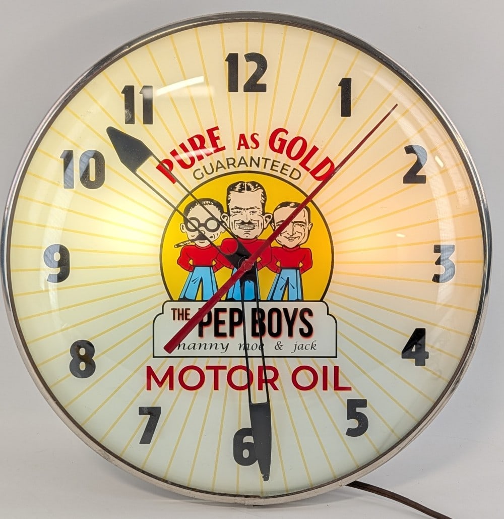 Custom Vintage Pep Boys Motor Oil Lighted PAM Clock: Vintage Pep Boys Motor Oil Lighted advertising PAM clock. Clock features an original PAM body, outer glass, and mechanical parts. The glass face appears to be a replacement. Clock appears to work well