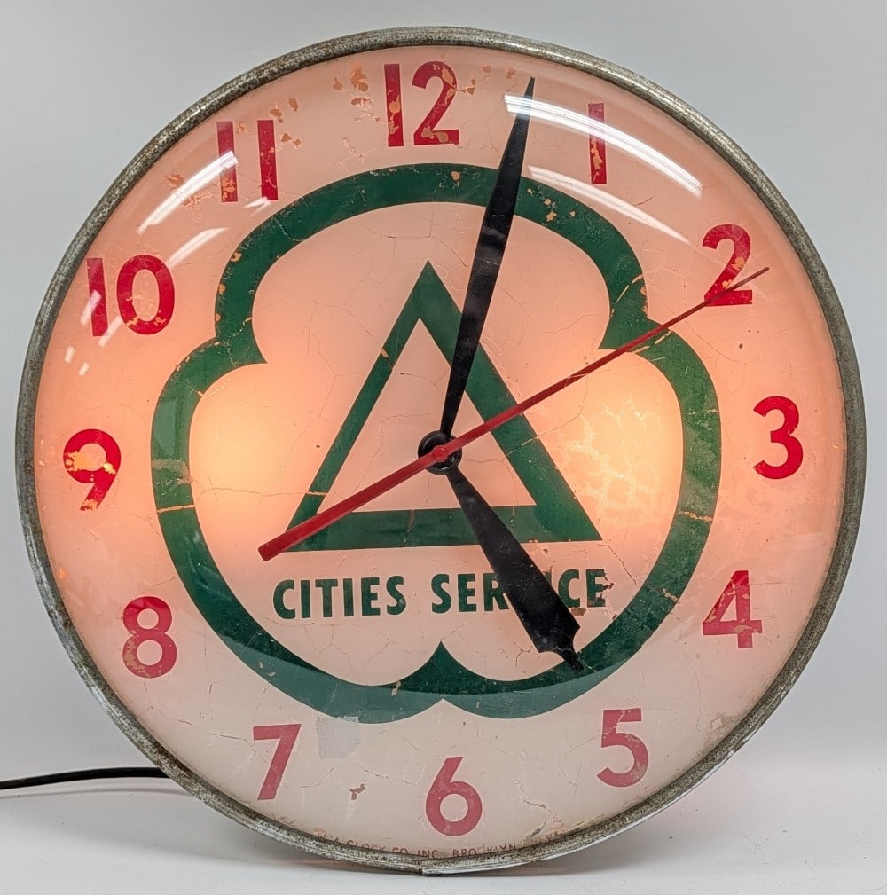 Vintage Cities Services Gas Station PAM Clock: Vintage Cities Service PAM lighted glass advertising clock. Fair condition with paint loss on face, surface rust on can, and other wear form use and age. Clock and lights both work. It measures approx