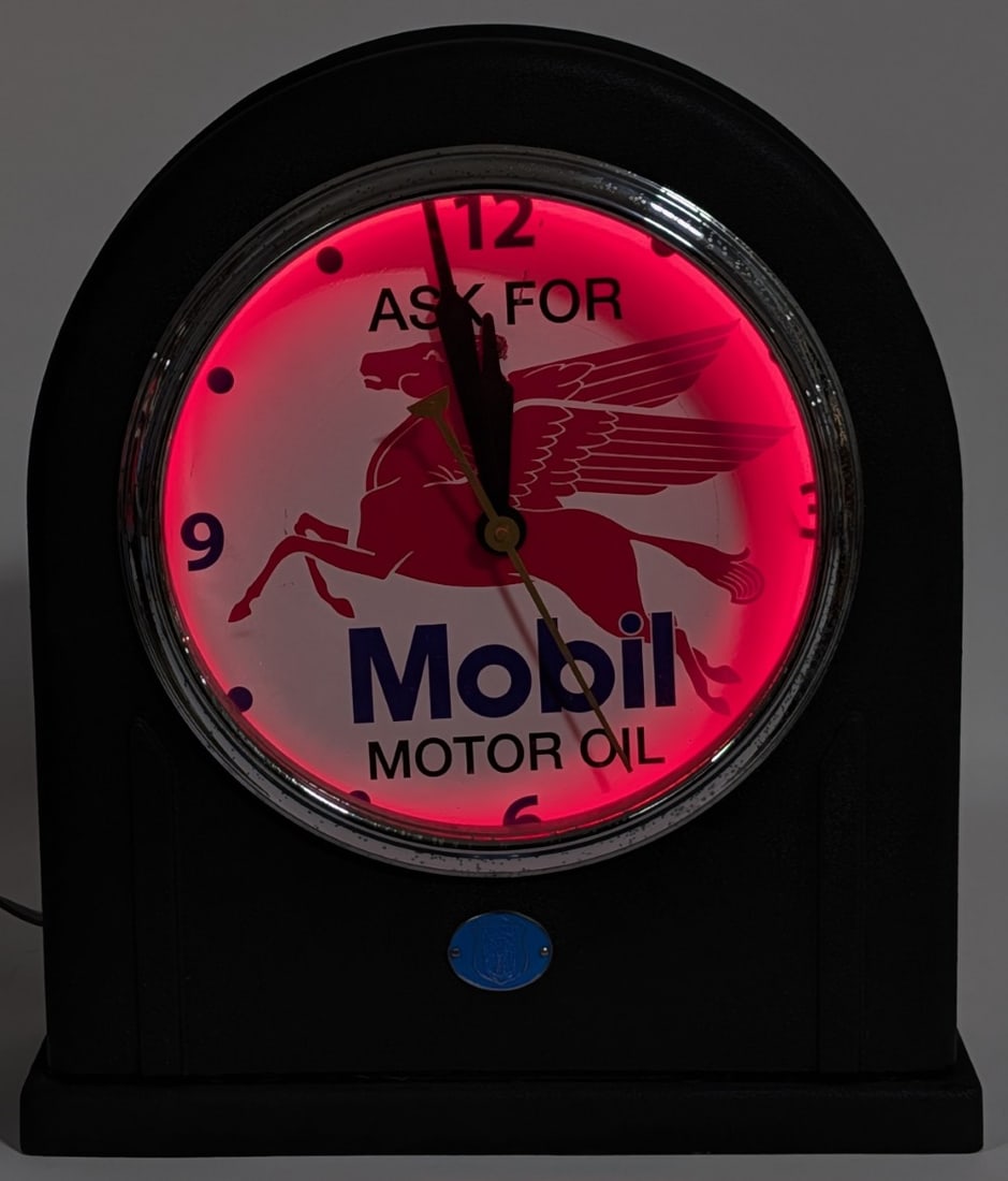 Custom Simplex Mobil Motor Oil Clock: Custom Simplex Mobil Motor Oil advertising clock. The clock has a red neon ring that lights up when plugged in. The clock also appears to run as it should. The clock has some pitting to the chrome,