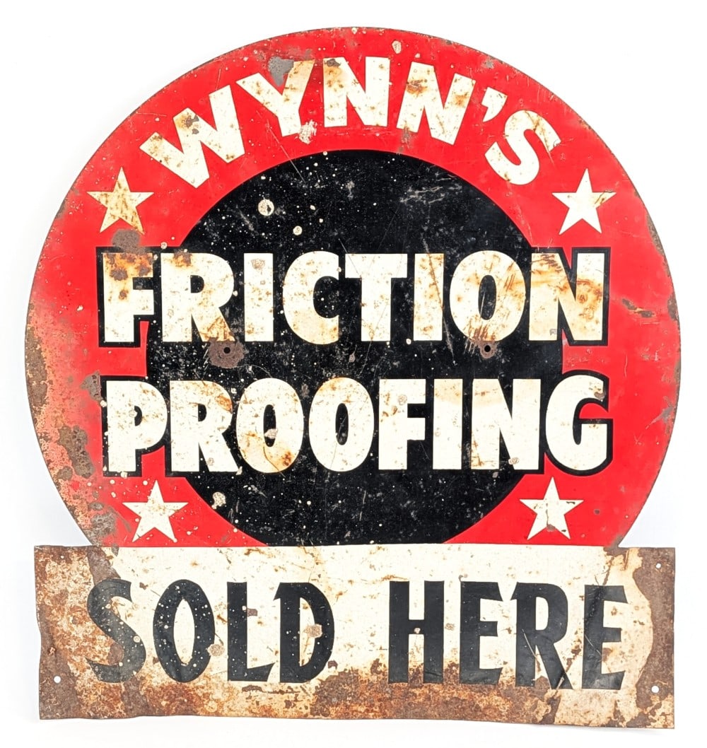 Vintage SST "Wynn's Friction Proofing Sold Here" Advertising Sign: Vintage single sided tin "Wynn's Friction Proofing Sold Here" die-cut advertising sign. The sign has rust, paint loss, bending, and wear from use and age. Measures approximately 21-1/4" tall by 20"