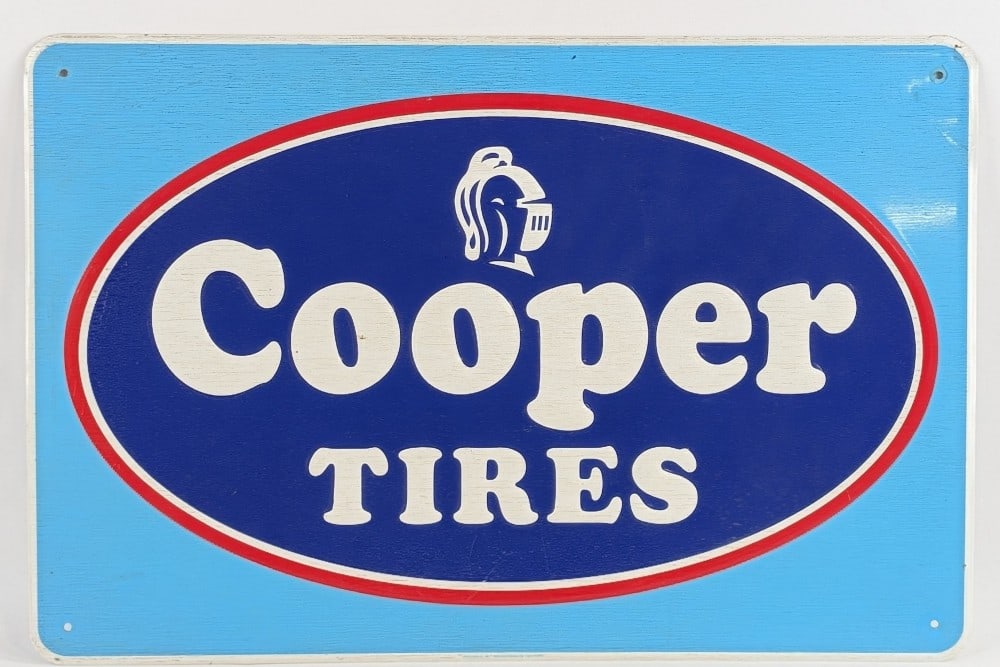 SST Cooper Tires Embossed Advertising Sign: Vintage single sided tin Cooper Tires embossed advertising sign. The sign looks like the plastic cover melted to it. It still displays well with a unique look and good color. It is marked Scioto Sign