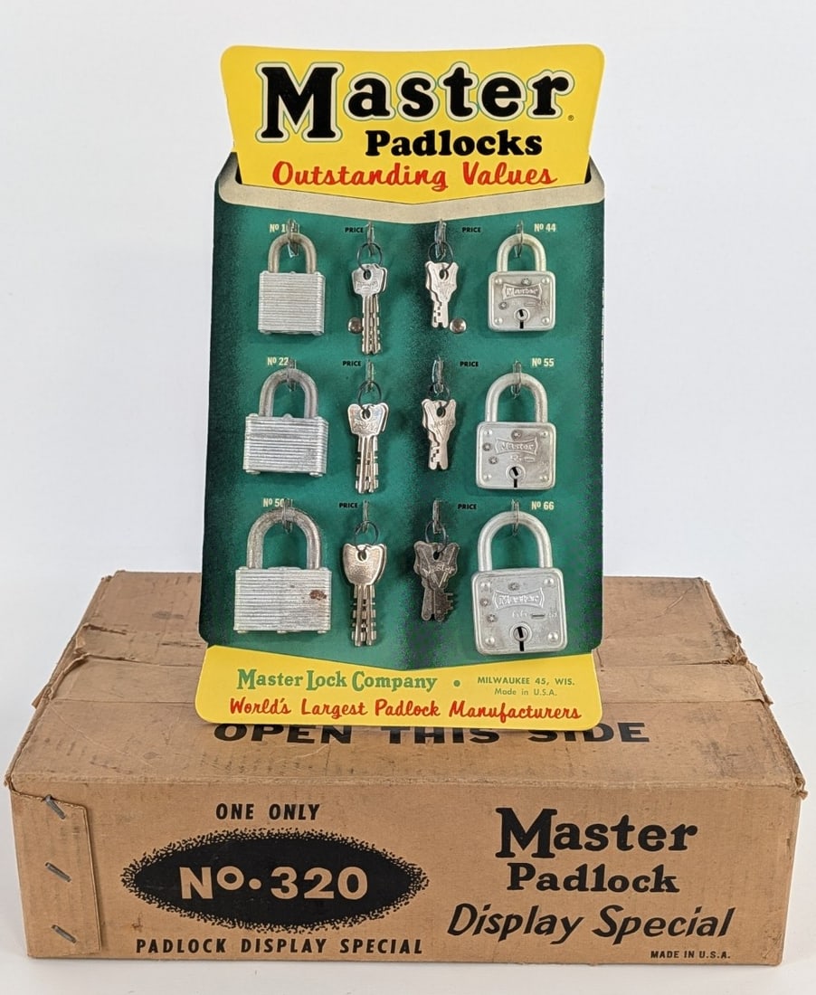 NOS Vintage Master Padlocks Store Display In Original Box: New old stock vintage Master Padlocks Store display in original box. Appear sto be in very nice condition with light wear form age and storage. It measures approximately 12in tall by 7-1/2in across.