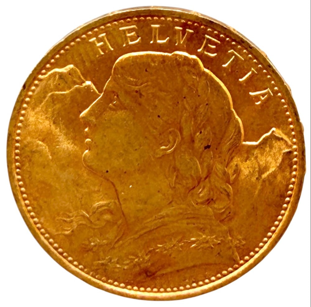 1922-B Swiss 20 Franc 90% Fine Gold Coin: 1922-B Swiss 20 Franc Gold Coin. The coin is 90% fine gold and the actual gold weight is 0.1867 troy ounce of pure gold.