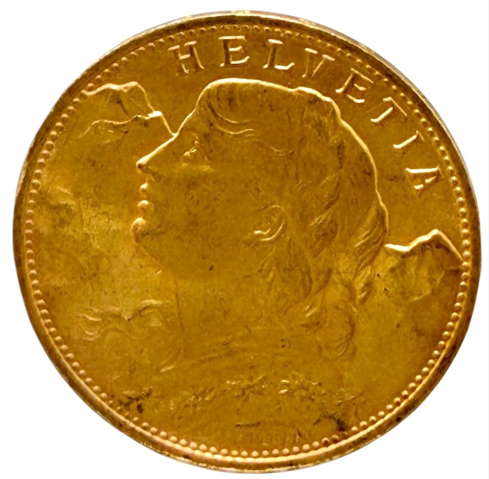 1925-B Swiss 20 Franc 90% Fine Gold Coin: 1925-B Swiss 20 Franc Gold Coin. The coin is 90% fine gold and the actual gold weight is 0.1867 troy ounce of pure gold.