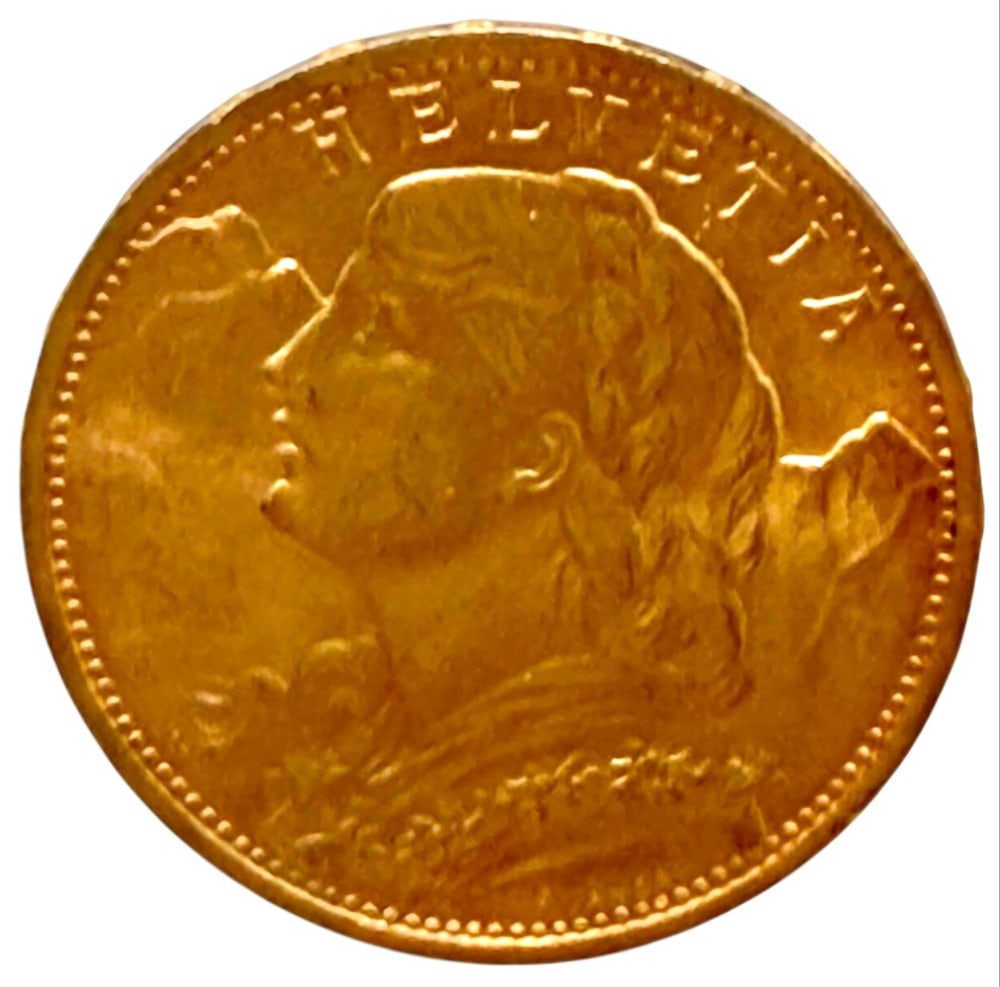 1927-B Swiss 20 Franc 90% Fine Gold Coin: 1927-B Swiss 20 Franc Gold Coin. The coin is 90% fine gold and the actual gold weight is 0.1867 troy ounce of pure gold.