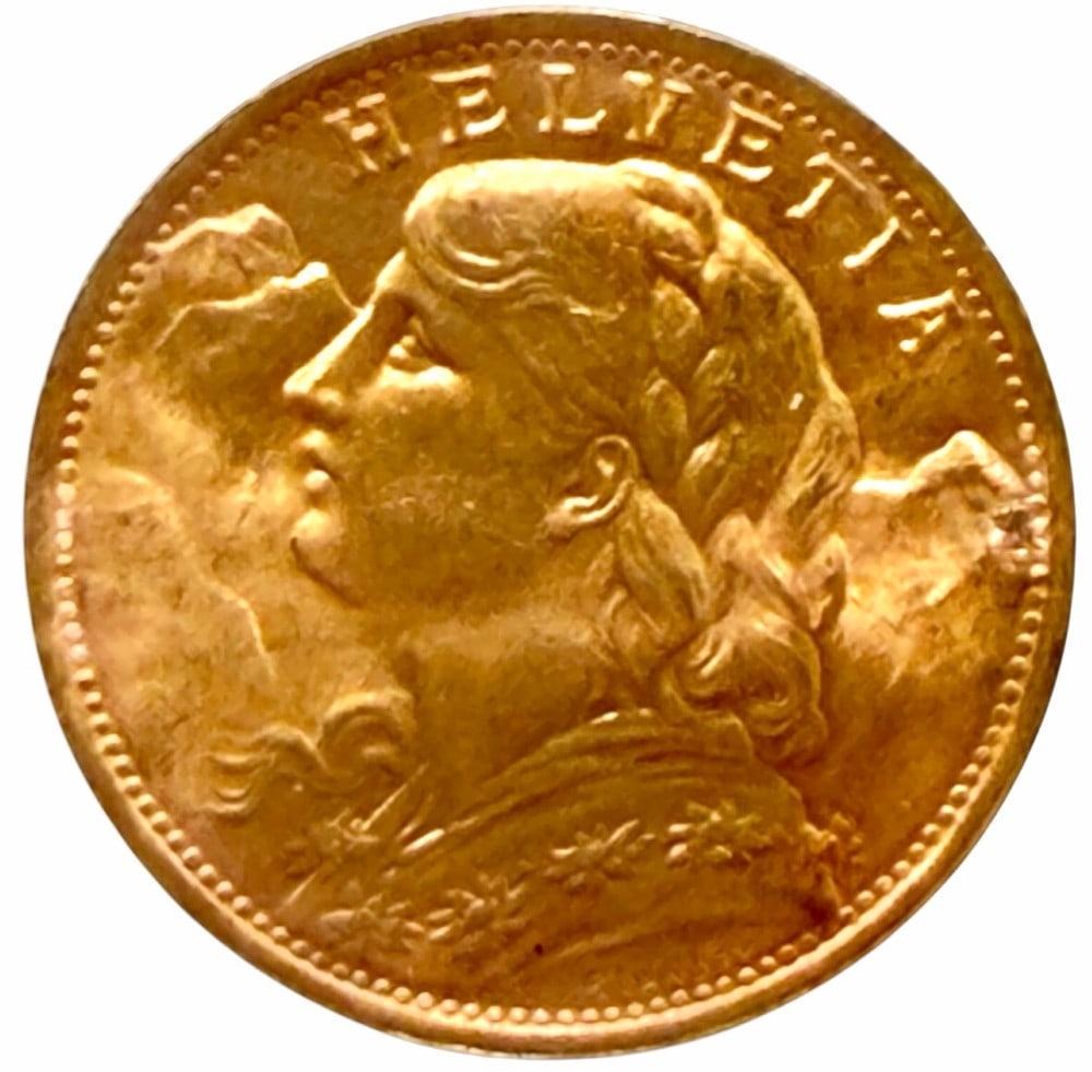 1935-B Swiss 20 Franc 90% Fine Gold Coin: 1935-B Swiss 20 Franc Gold Coin. The coin is 90% fine gold and the actual gold weight is 0.1867 troy ounce of pure gold.