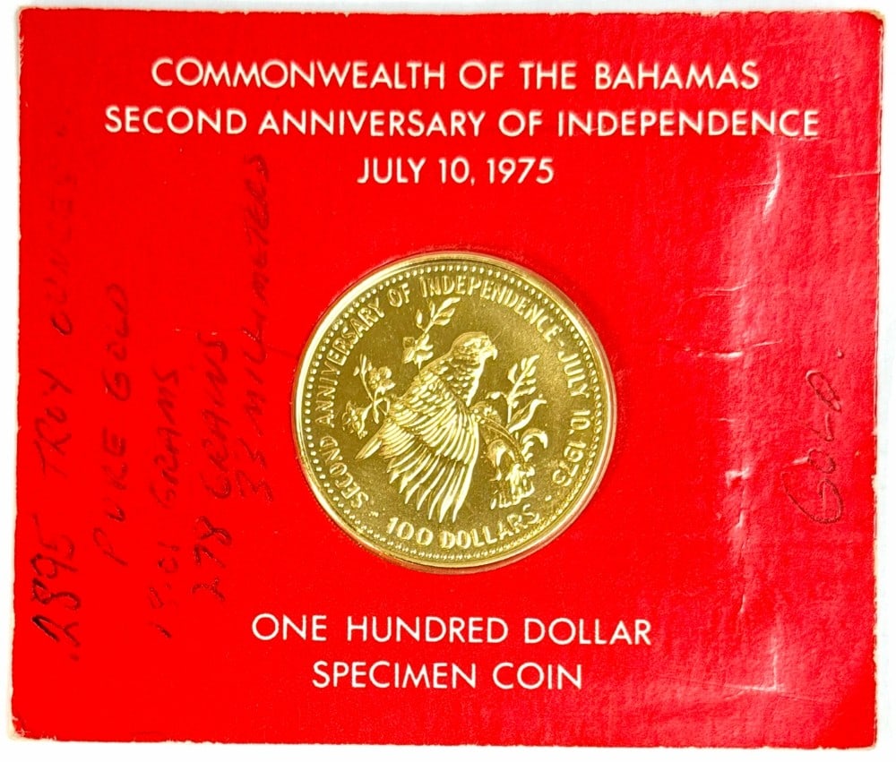 1975 Commonwealth Of Bahamas Second Anniversary Of Independence $100 Specimen Gold Coin: 1975 Commonwealth Of Bahamas Second Anniversary Of Independence $100 Specimen Gold Coin. The coin is .500 fine and contains .2896 troy ounces of pure gold. Mint condition in the original holder.