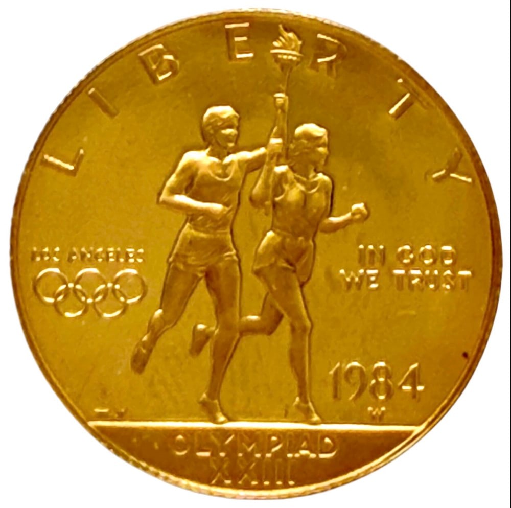 1984-W United States $10 Olympiad XXIII Commemorative Gold Proof Coin: 1984-W United States $10 Olympiad XXIII Commemorative Gold Proof Coin. The coin contains .4847 troy ounce of .999 pure gold. Comes in capsule.