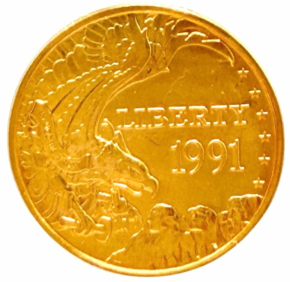 1991-W United States $5 Mount Rushmore National Memorial Commemorative Gold Uncirculated Coin: 1991-W United States $5 Mount Rushmore National Memorial Commemorative Gold Uncirculated Coin. The coin contains .2419 troy ounce of .999 pure gold.