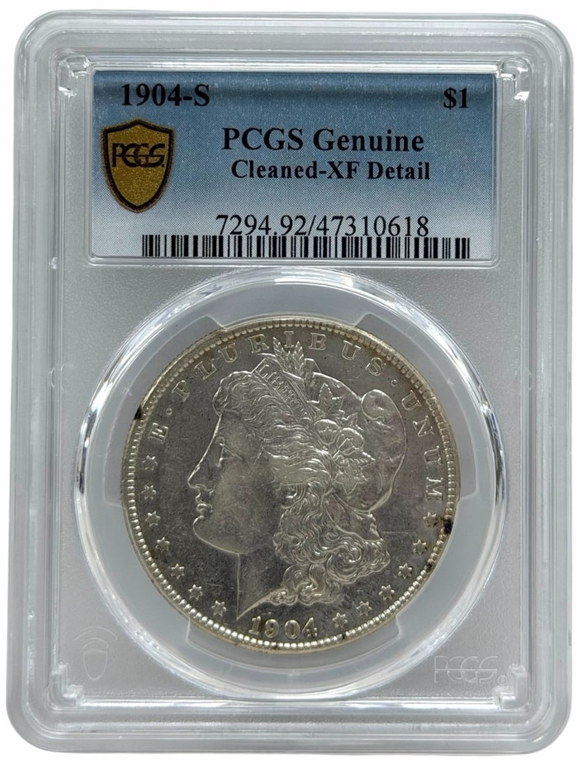 1904-S United States Morgan Silver Dollar PCGS Genuine Cleaned XF Detail: 1904-S United States Morgan Silver Dollar. Graded Genuine Cleaned XF Detail by PCGS.