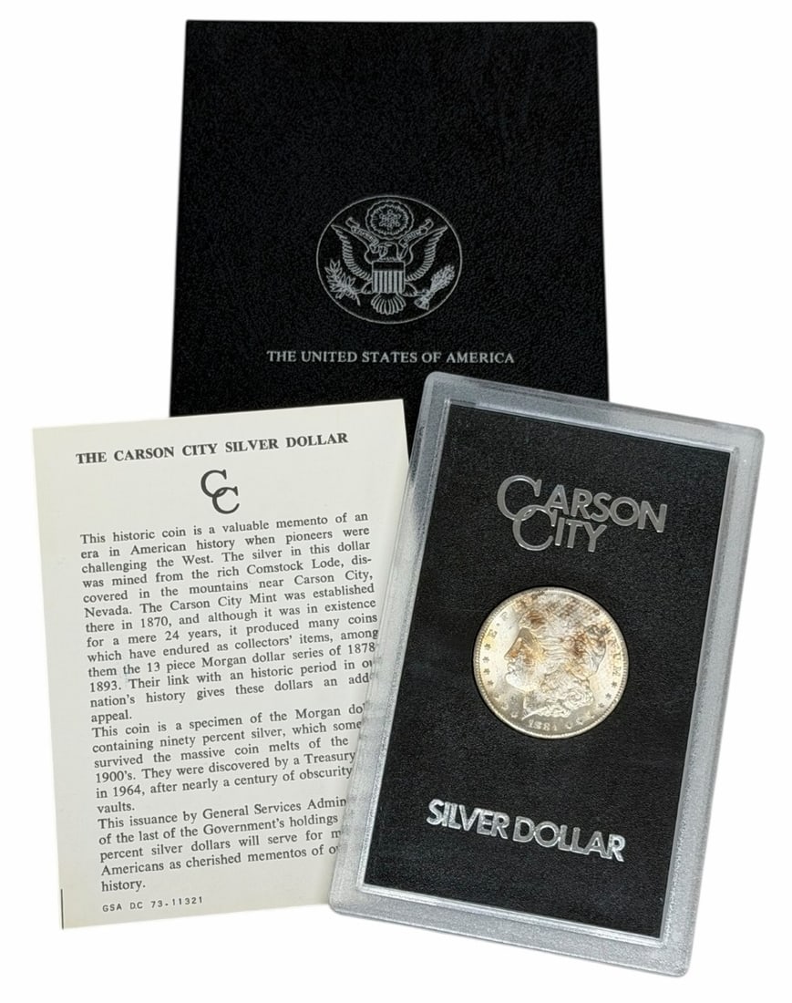 GSA 1884-CC Morgan Silver Dollar In Case: GSA 1884-CC Morgan Silver Dollar. Comes in the GSA plastic holder in the original box with the certificate.
