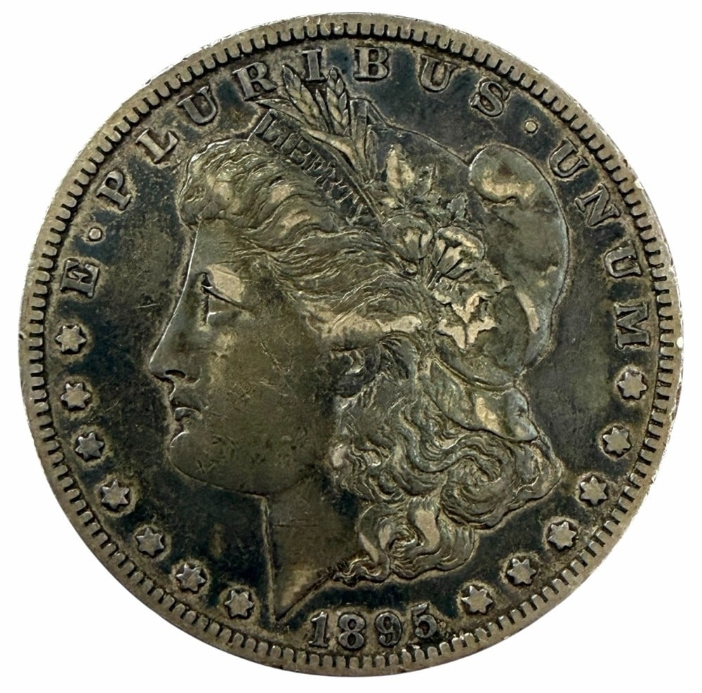 Key Date 1895-O United States Morgan Silver Dollar: Key Date 1895-O United States Morgan Silver Dollar in circulated condition.